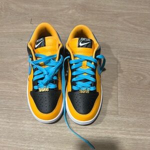 Nike Black and Yellow Sneakers with Blue Accents